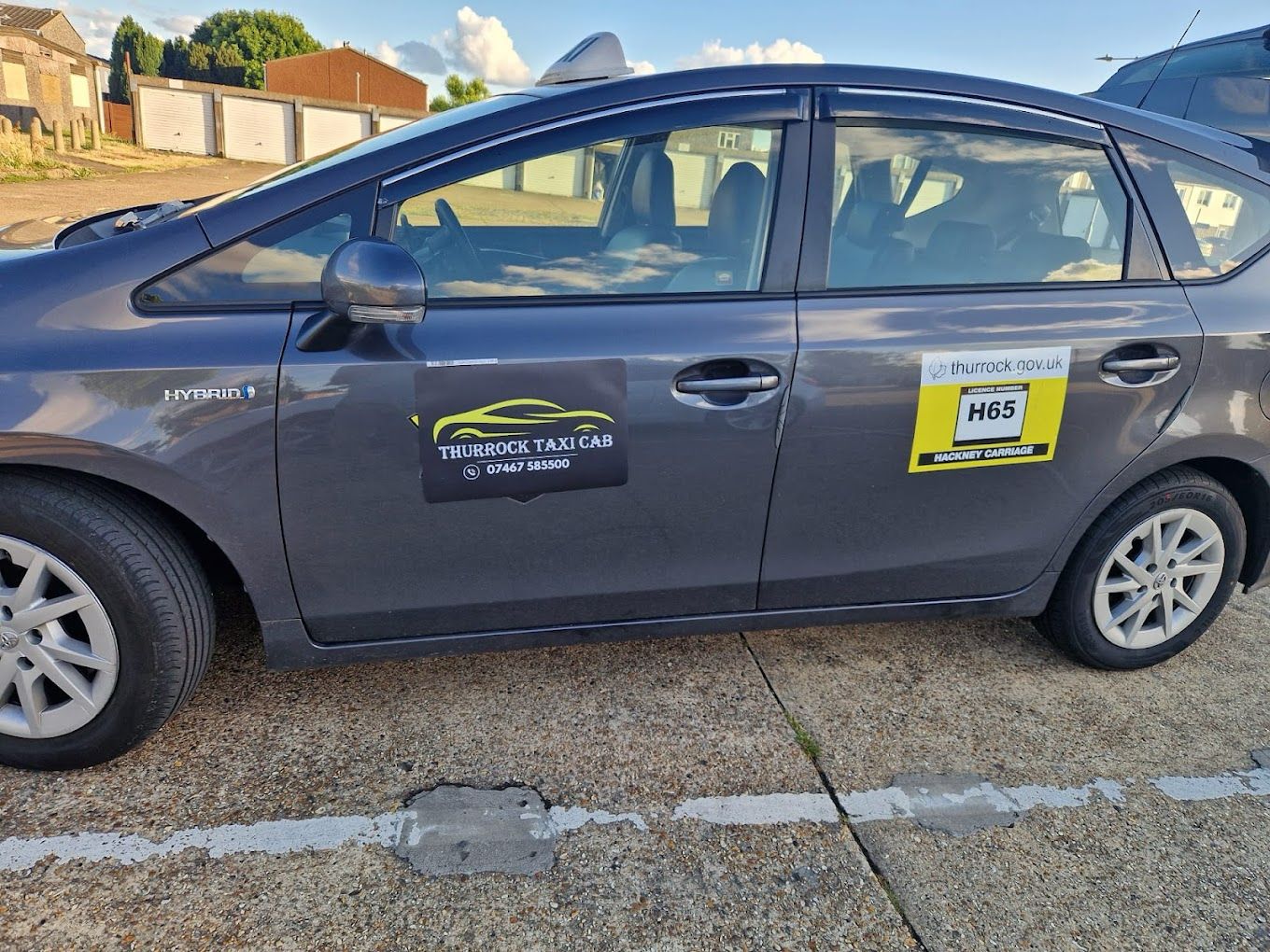 Thurrock Taxi Cab car parked on a street